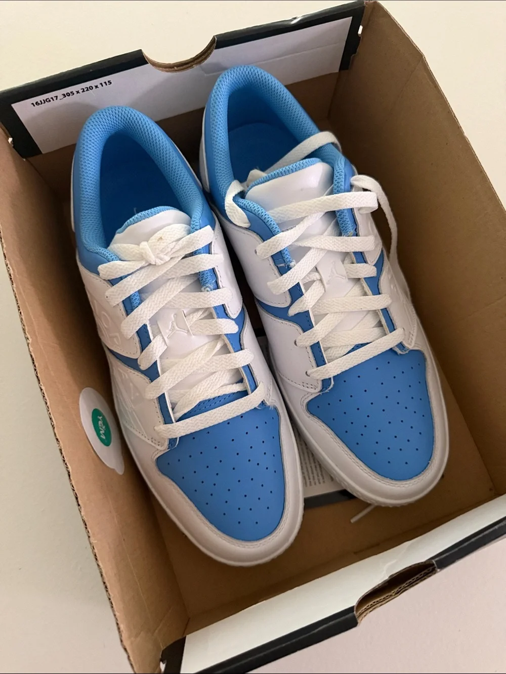 Jordan Nu Retro 1 G White and University Blue Low-Top Golf Sneakers, Spiked